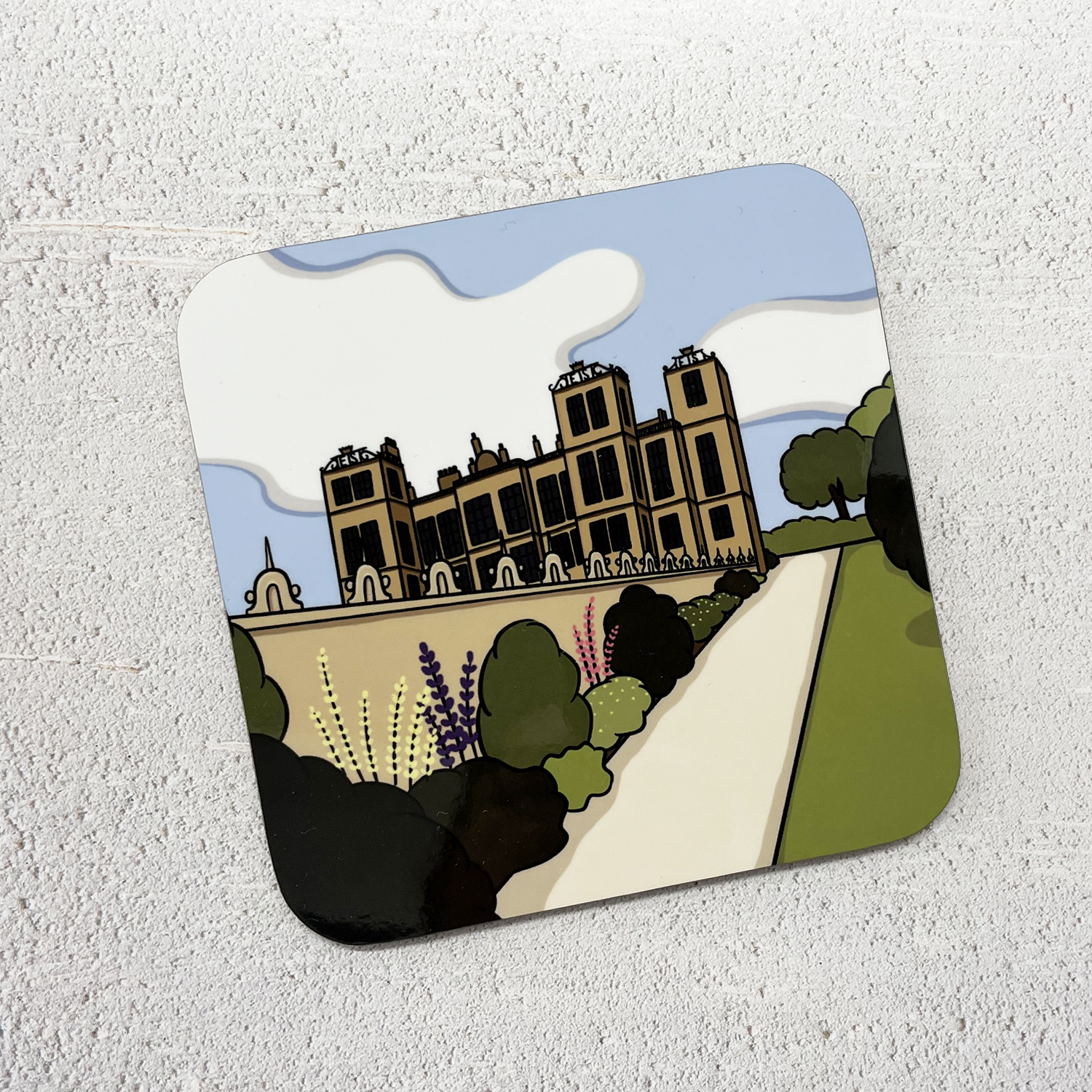 A coaster depicting an illustration of Hardwick Hall